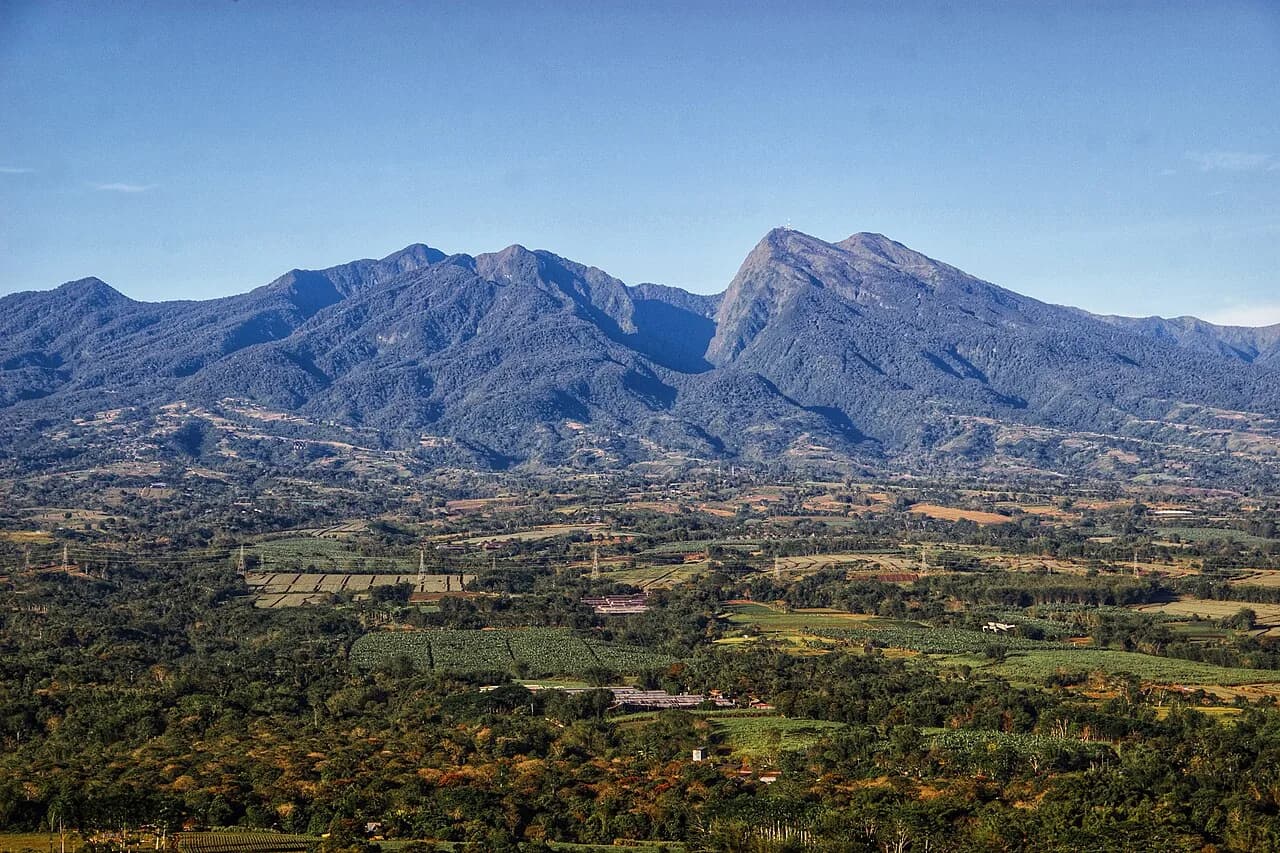 Forest-covered peaks of Mount Kitanglad Range Natural Park seen from Panimahawa Ridge